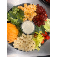 CHEESE BOARD WITH FRUIT AND CRACKERS